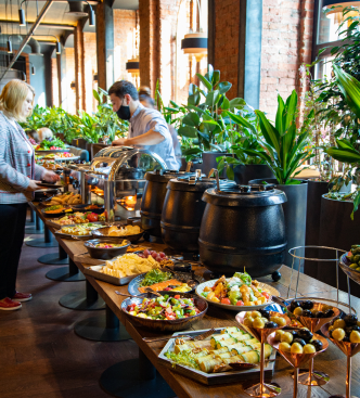 A generous buffet spread prepared for a corporate event